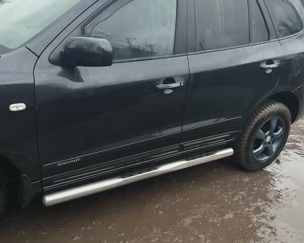 Черный Хендай Санта Фе, объемом двигателя 2.2 л и пробегом 244 тыс. км за 10500 $, фото 2 на Automoto.ua