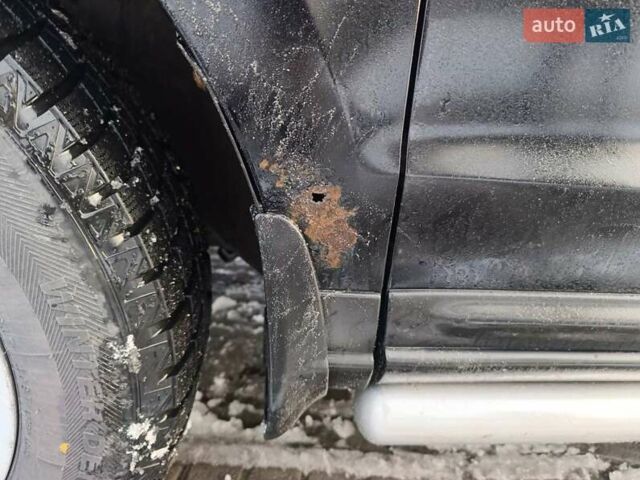 Черный Хендай Санта Фе, объемом двигателя 2.19 л и пробегом 250 тыс. км за 8600 $, фото 6 на Automoto.ua