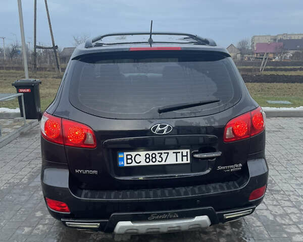 Черный Хендай Санта Фе, объемом двигателя 2.7 л и пробегом 246 тыс. км за 7900 $, фото 3 на Automoto.ua