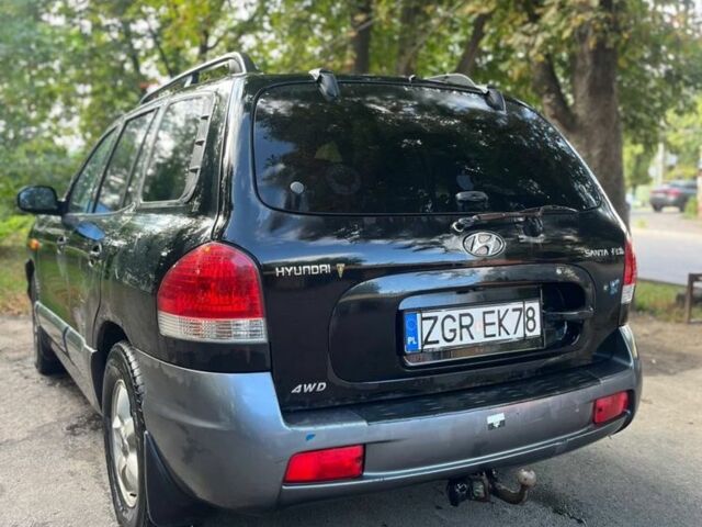 Черный Хендай Санта Фе, объемом двигателя 2 л и пробегом 350 тыс. км за 3000 $, фото 3 на Automoto.ua