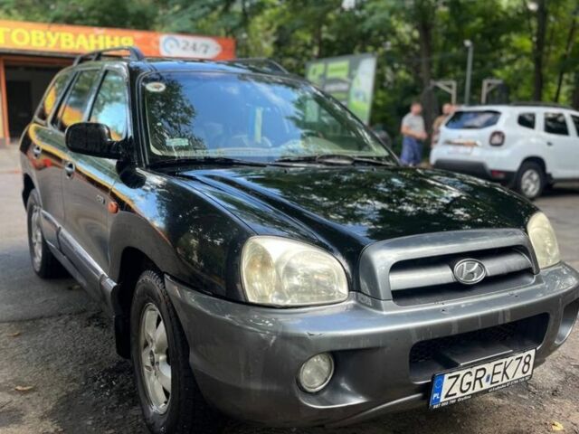 Черный Хендай Санта Фе, объемом двигателя 2 л и пробегом 350 тыс. км за 3000 $, фото 1 на Automoto.ua