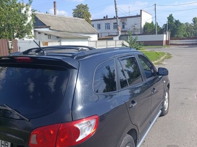 Черный Хендай Санта Фе, объемом двигателя 2.2 л и пробегом 221 тыс. км за 7900 $, фото 1 на Automoto.ua