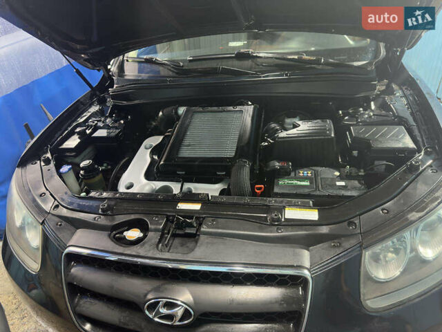 Черный Хендай Санта Фе, объемом двигателя 2.19 л и пробегом 214 тыс. км за 9700 $, фото 20 на Automoto.ua