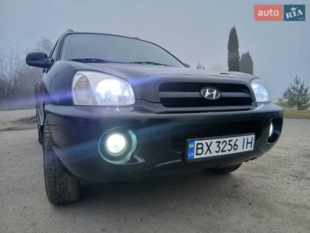 Черный Хендай Санта Фе, объемом двигателя 2.66 л и пробегом 195 тыс. км за 5699 $, фото 1 на Automoto.ua