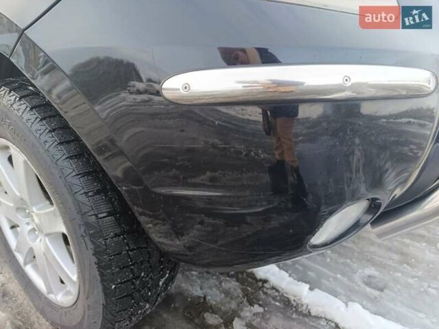 Черный Хендай Санта Фе, объемом двигателя 2.19 л и пробегом 250 тыс. км за 8600 $, фото 4 на Automoto.ua