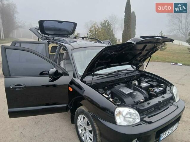 Черный Хендай Санта Фе, объемом двигателя 2.66 л и пробегом 195 тыс. км за 5699 $, фото 58 на Automoto.ua