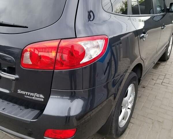 Черный Хендай Санта Фе, объемом двигателя 2.2 л и пробегом 245 тыс. км за 9500 $, фото 1 на Automoto.ua