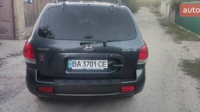 Чорний Хендай Санта Фе, об'ємом двигуна 2 л та пробігом 315 тис. км за 5000 $, фото 1 на Automoto.ua