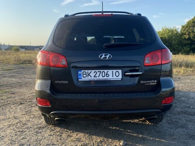 Черный Хендай Санта Фе, объемом двигателя 2.2 л и пробегом 245 тыс. км за 9500 $, фото 5 на Automoto.ua