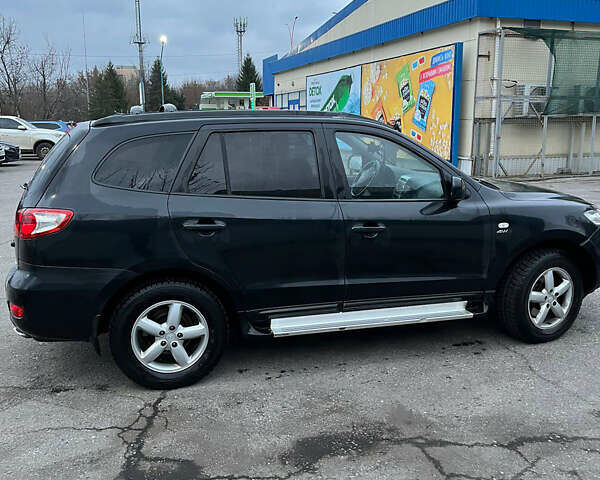 Черный Хендай Санта Фе, объемом двигателя 2.2 л и пробегом 307 тыс. км за 5770 $, фото 2 на Automoto.ua
