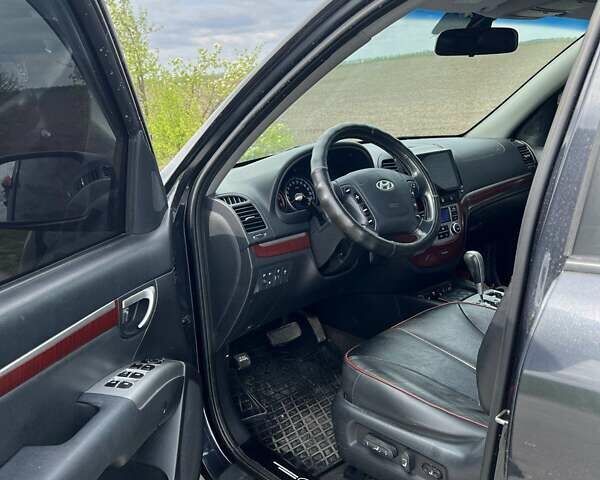 Черный Хендай Санта Фе, объемом двигателя 2.2 л и пробегом 265 тыс. км за 9000 $, фото 2 на Automoto.ua