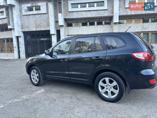 Черный Хендай Санта Фе, объемом двигателя 2.19 л и пробегом 215 тыс. км за 8500 $, фото 4 на Automoto.ua