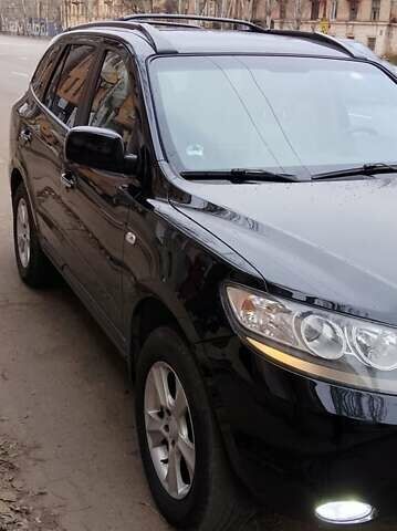 Черный Хендай Санта Фе, объемом двигателя 2.19 л и пробегом 210 тыс. км за 9900 $, фото 1 на Automoto.ua