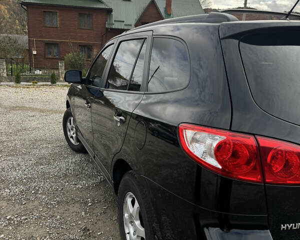 Черный Хендай Санта Фе, объемом двигателя 2.19 л и пробегом 174 тыс. км за 9500 $, фото 9 на Automoto.ua