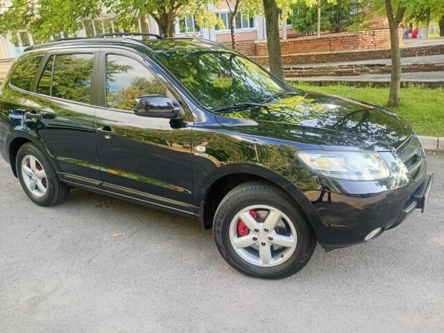 Черный Хендай Санта Фе, объемом двигателя 2.7 л и пробегом 250 тыс. км за 8500 $, фото 2 на Automoto.ua