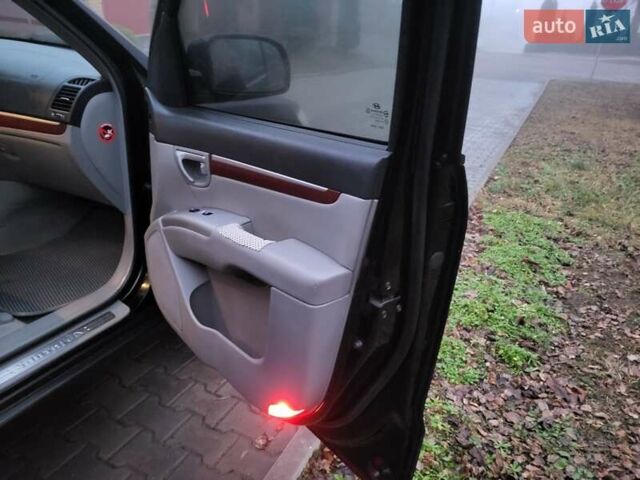 Черный Хендай Санта Фе, объемом двигателя 2.2 л и пробегом 174 тыс. км за 9850 $, фото 70 на Automoto.ua