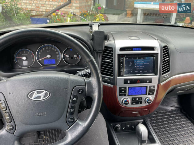 Черный Хендай Санта Фе, объемом двигателя 2.19 л и пробегом 193 тыс. км за 11000 $, фото 7 на Automoto.ua