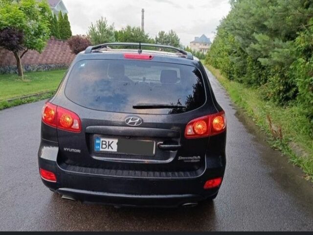Чорний Хендай Санта Фе, об'ємом двигуна 2.2 л та пробігом 237 тис. км за 6700 $, фото 2 на Automoto.ua