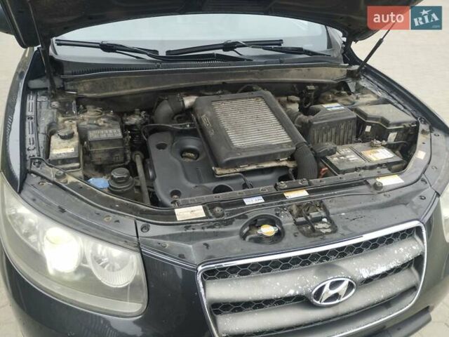 Черный Хендай Санта Фе, объемом двигателя 2.19 л и пробегом 303 тыс. км за 9000 $, фото 10 на Automoto.ua