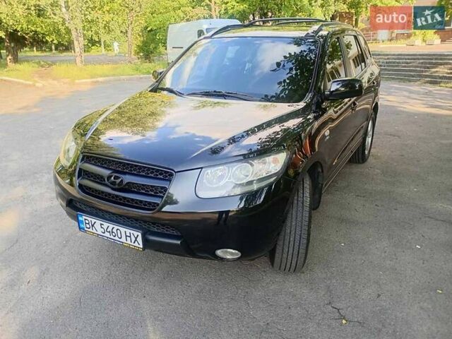 Черный Хендай Санта Фе, объемом двигателя 2.66 л и пробегом 250 тыс. км за 8800 $, фото 5 на Automoto.ua