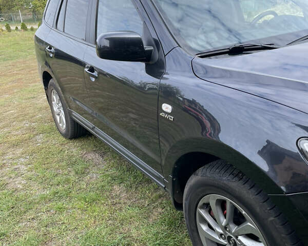 Черный Хендай Санта Фе, объемом двигателя 2.19 л и пробегом 193 тыс. км за 11000 $, фото 3 на Automoto.ua