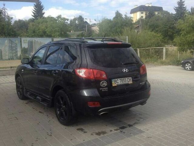 Черный Хендай Санта Фе, объемом двигателя 2 л и пробегом 226 тыс. км за 7900 $, фото 1 на Automoto.ua