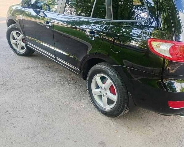 Черный Хендай Санта Фе, объемом двигателя 2.66 л и пробегом 250 тыс. км за 8800 $, фото 3 на Automoto.ua