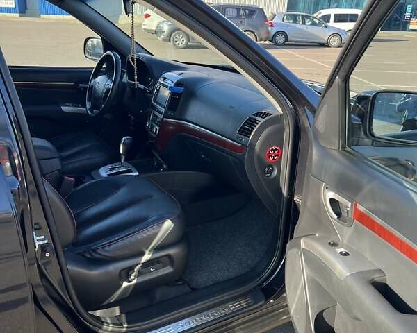 Черный Хендай Санта Фе, объемом двигателя 2.19 л и пробегом 240 тыс. км за 10500 $, фото 9 на Automoto.ua