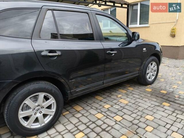 Черный Хендай Санта Фе, объемом двигателя 2.2 л и пробегом 296 тыс. км за 9799 $, фото 15 на Automoto.ua