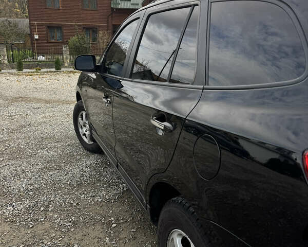 Черный Хендай Санта Фе, объемом двигателя 2.19 л и пробегом 174 тыс. км за 9500 $, фото 12 на Automoto.ua