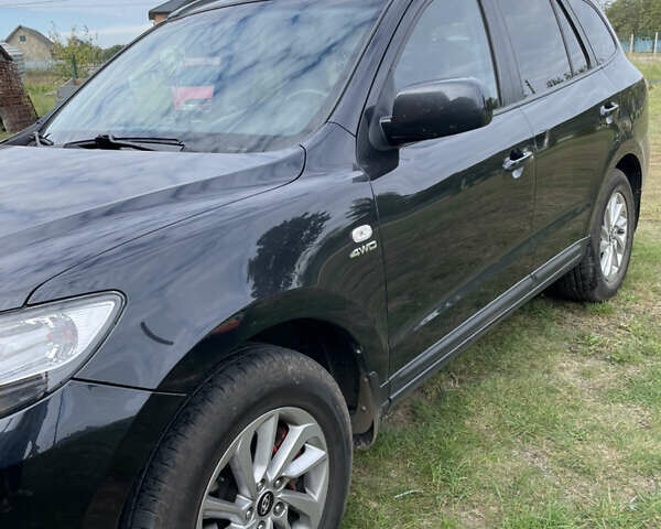 Черный Хендай Санта Фе, объемом двигателя 2.19 л и пробегом 193 тыс. км за 11000 $, фото 2 на Automoto.ua