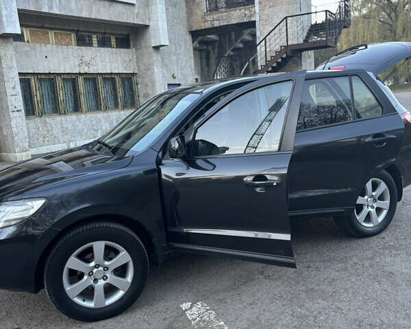 Черный Хендай Санта Фе, объемом двигателя 2.19 л и пробегом 215 тыс. км за 8500 $, фото 18 на Automoto.ua