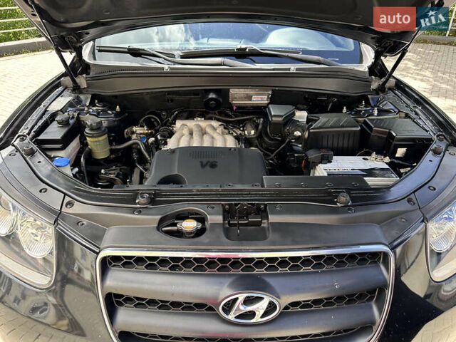 Черный Хендай Санта Фе, объемом двигателя 2.66 л и пробегом 241 тыс. км за 9700 $, фото 25 на Automoto.ua