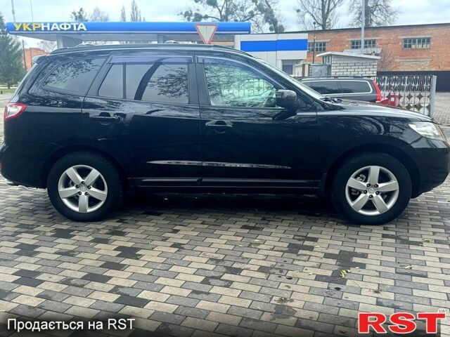 Черный Хендай Санта Фе, объемом двигателя 2.7 л и пробегом 217 тыс. км за 7900 $, фото 3 на Automoto.ua