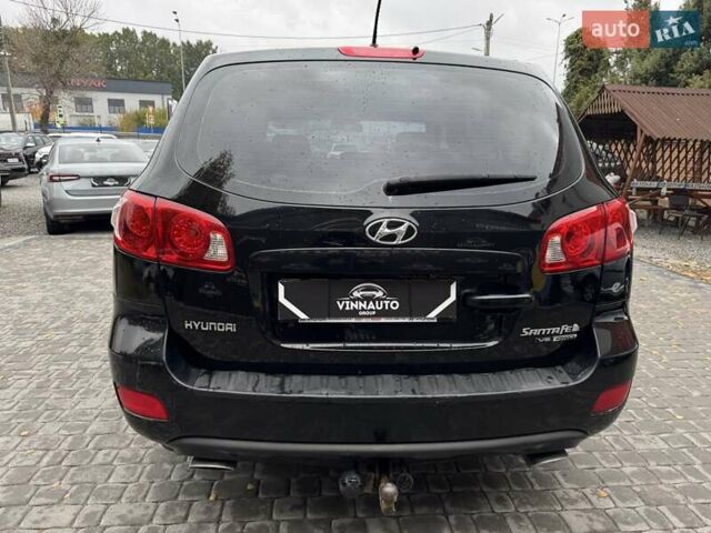 Черный Хендай Санта Фе, объемом двигателя 2.7 л и пробегом 361 тыс. км за 8300 $, фото 13 на Automoto.ua