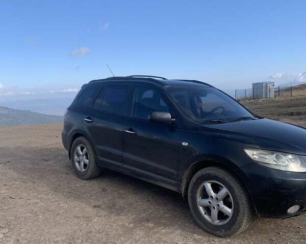 Черный Хендай Санта Фе, объемом двигателя 2.19 л и пробегом 220 тыс. км за 10000 $, фото 1 на Automoto.ua