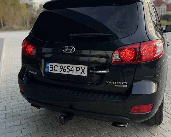 Черный Хендай Санта Фе, объемом двигателя 2.19 л и пробегом 235 тыс. км за 9999 $, фото 9 на Automoto.ua