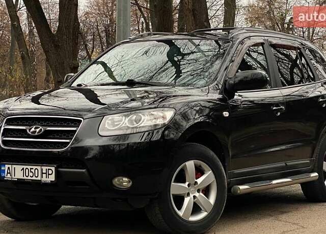 Черный Хендай Санта Фе, объемом двигателя 2.7 л и пробегом 307 тыс. км за 8900 $, фото 3 на Automoto.ua