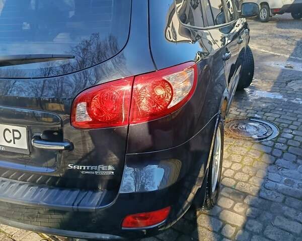 Черный Хендай Санта Фе, объемом двигателя 2.19 л и пробегом 179 тыс. км за 10300 $, фото 6 на Automoto.ua