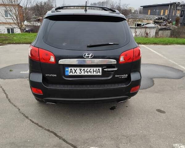 Чорний Хендай Санта Фе, об'ємом двигуна 2.7 л та пробігом 223 тис. км за 9499 $, фото 3 на Automoto.ua