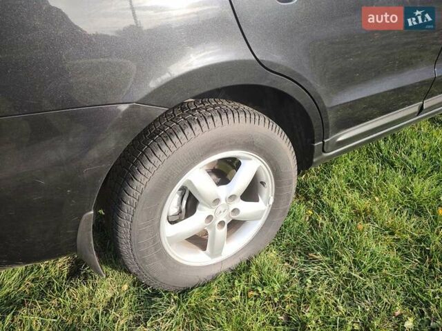 Черный Хендай Санта Фе, объемом двигателя 2.19 л и пробегом 181 тыс. км за 11000 $, фото 20 на Automoto.ua