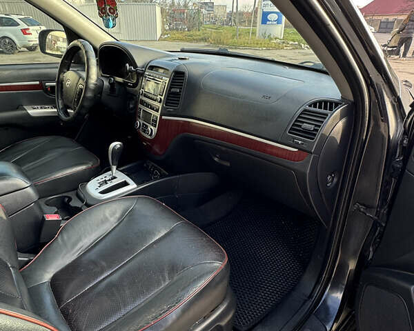 Черный Хендай Санта Фе, объемом двигателя 2.19 л и пробегом 234 тыс. км за 11000 $, фото 15 на Automoto.ua