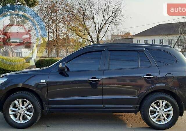 Черный Хендай Санта Фе, объемом двигателя 2.2 л и пробегом 230 тыс. км за 10700 $, фото 1 на Automoto.ua