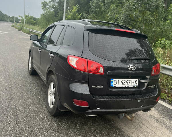 Черный Хендай Санта Фе, объемом двигателя 2.2 л и пробегом 260 тыс. км за 10000 $, фото 4 на Automoto.ua