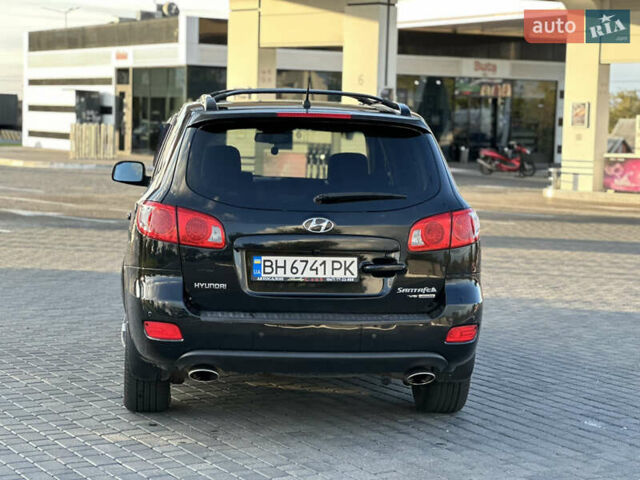 Чорний Хендай Санта Фе, об'ємом двигуна 2.7 л та пробігом 197 тис. км за 10000 $, фото 4 на Automoto.ua