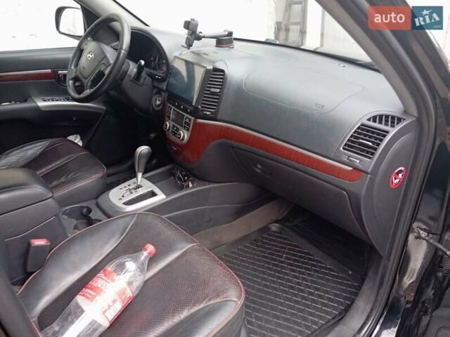 Черный Хендай Санта Фе, объемом двигателя 2.7 л и пробегом 188 тыс. км за 8500 $, фото 6 на Automoto.ua