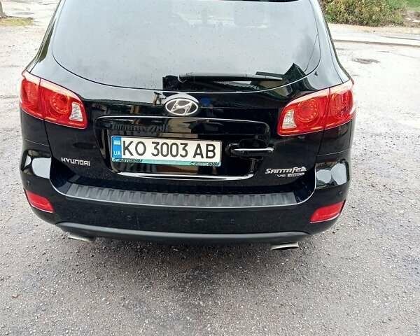 Черный Хендай Санта Фе, объемом двигателя 2.7 л и пробегом 152 тыс. км за 10500 $, фото 3 на Automoto.ua