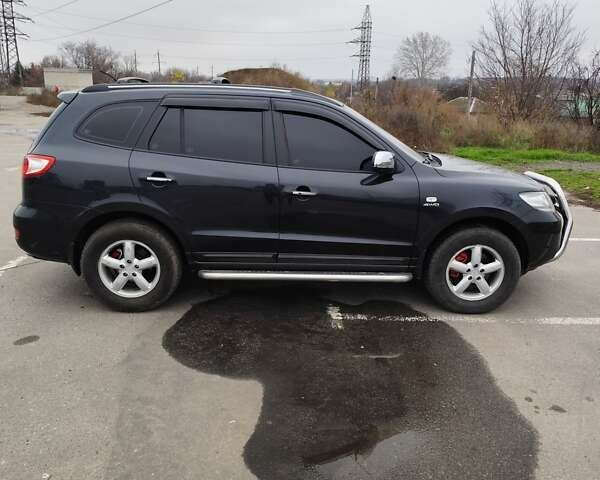 Чорний Хендай Санта Фе, об'ємом двигуна 2.7 л та пробігом 223 тис. км за 9499 $, фото 1 на Automoto.ua