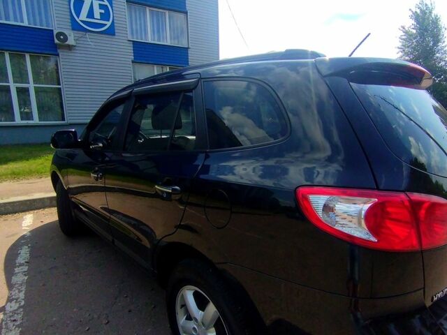 Черный Хендай Санта Фе, объемом двигателя 2.7 л и пробегом 300 тыс. км за 10200 $, фото 2 на Automoto.ua