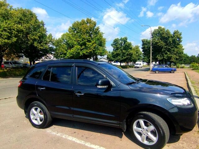 Черный Хендай Санта Фе, объемом двигателя 2.7 л и пробегом 300 тыс. км за 10200 $, фото 1 на Automoto.ua